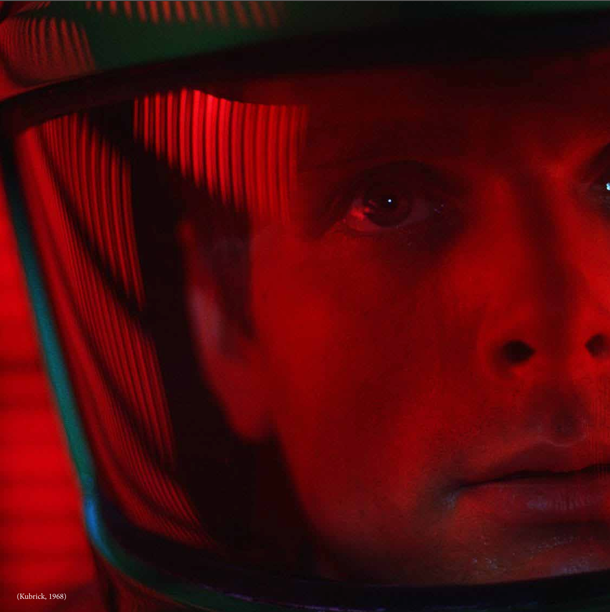 A frame from the movie 2001: A Space Odyssey that is covered in red showing anxiety and danger